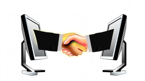 computer handshake business suit